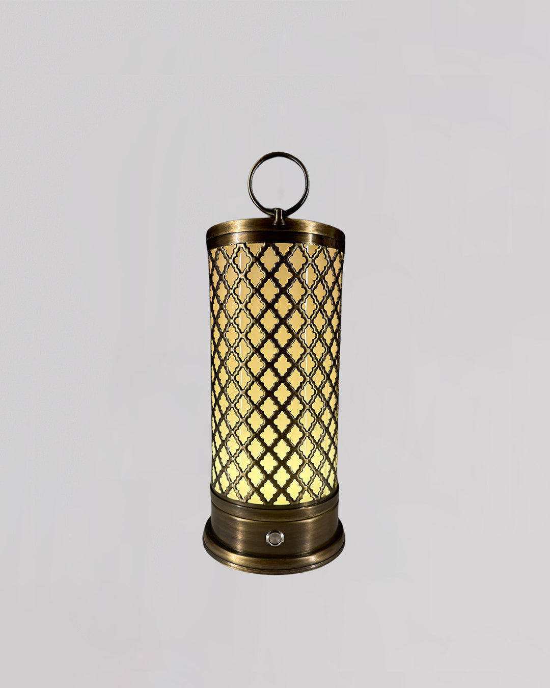 Decorative lantern with lattice design and glowing interior on a gray background