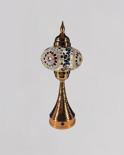 Decorative lamp with mosaic design on a gray background
