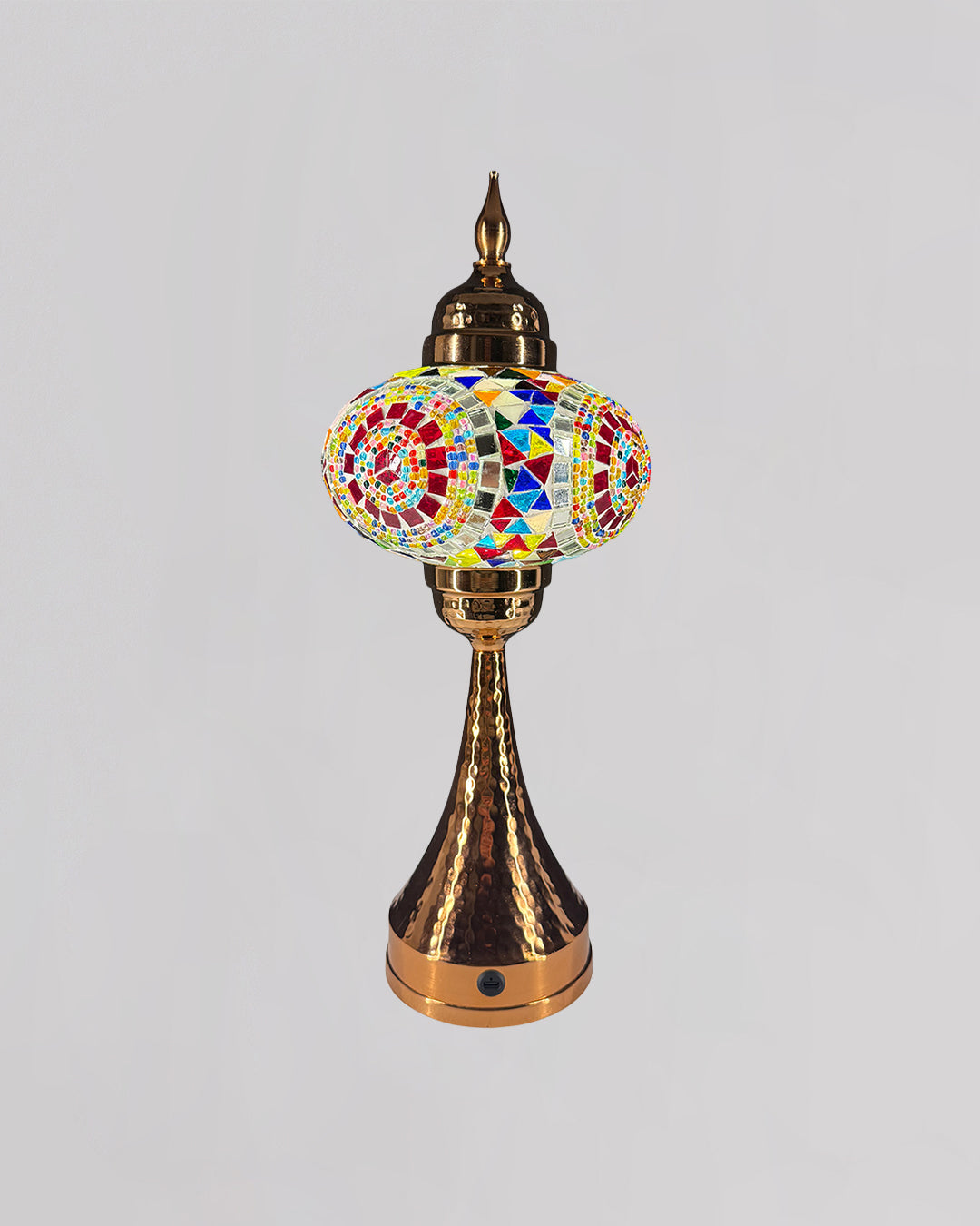 Decorative lamp with mosaic design on a gray background