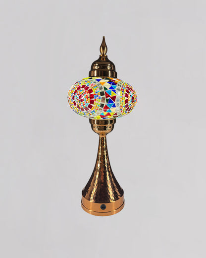 Decorative lamp with mosaic design on a gray background