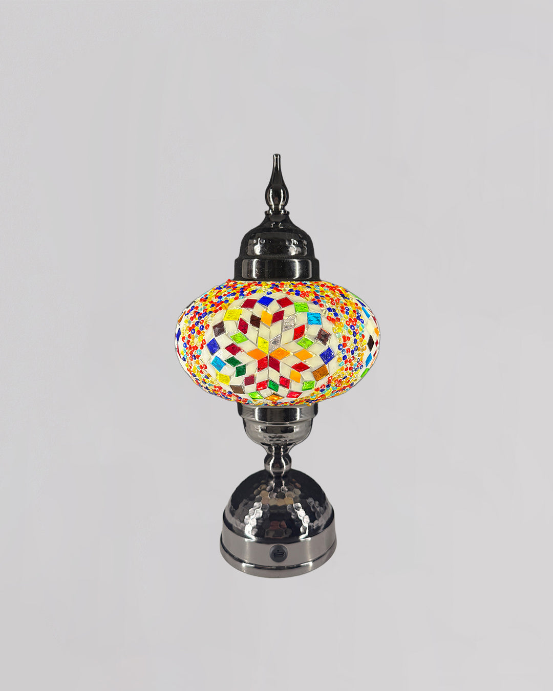 Colorful mosaic lamp on a gray background